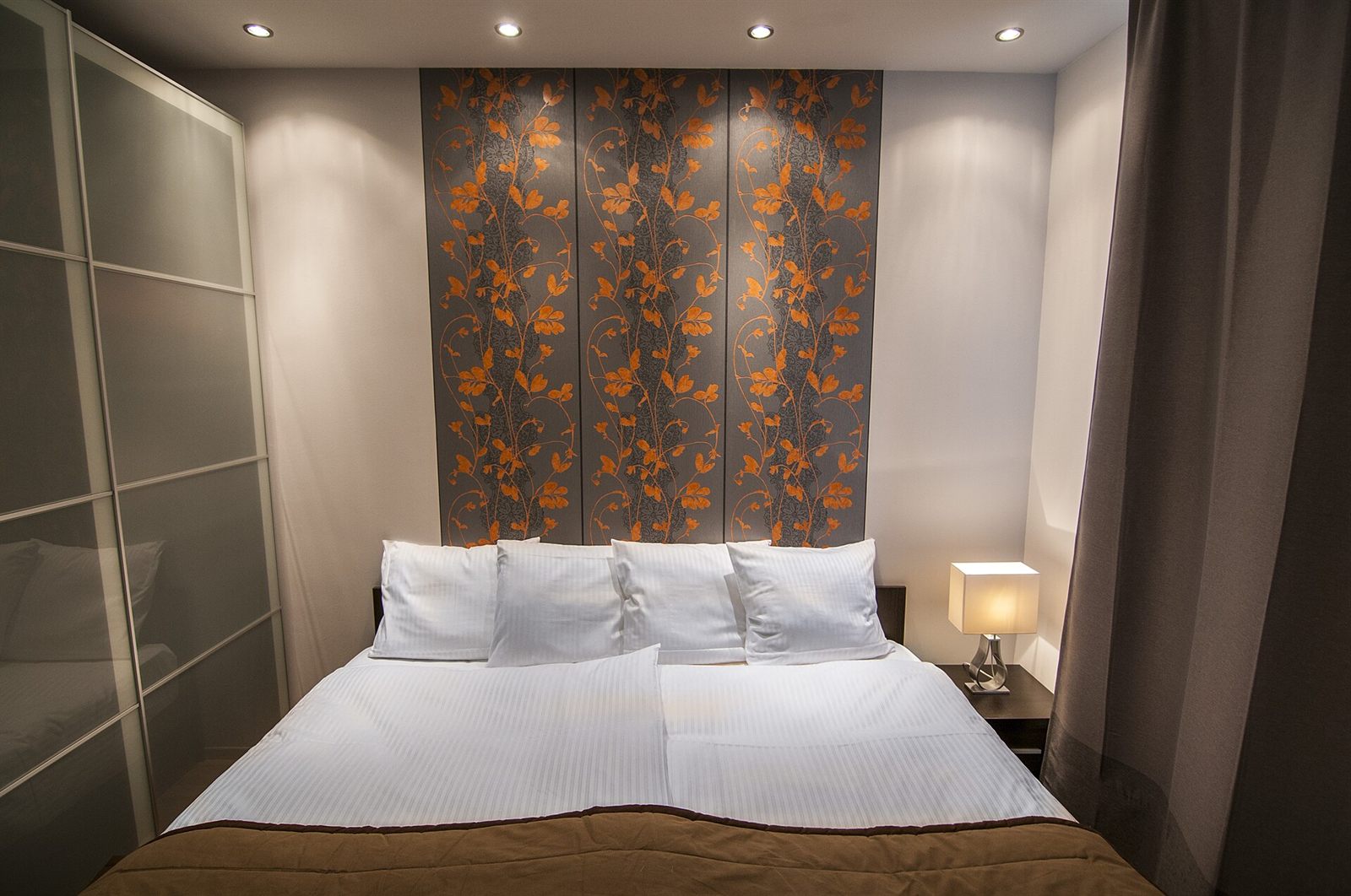 A bedroom arranged for rest